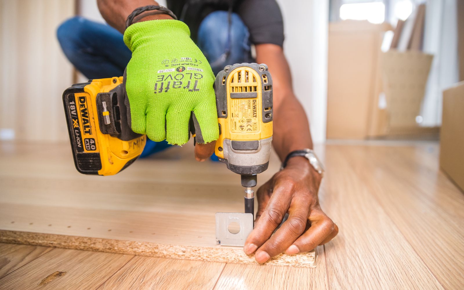 Hands-on renovation work with a power drill and fittings